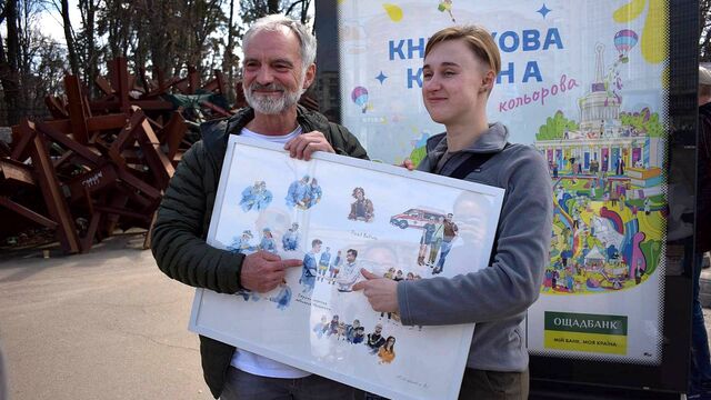 Ivan Trojan s paramedičkou Čajkou v Kyjevě, foto: Pavla Jirošová