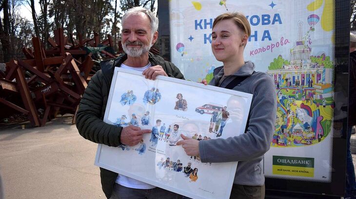 Ivan Trojan s paramedičkou Čajkou v Kyjevě, foto: Pavla Jirošová